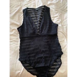 Deep cut sheer bodysuit.